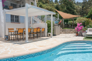 Heated pool and jacuzzi with panoramic countryside views at Villa Bellevue in Tourtour, Provence.