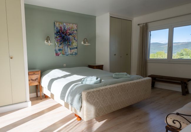 Villa Les Petits Puits - Serene Bedroom with Lavish Bed, Ensuite Bath, and Terrace in Provence
